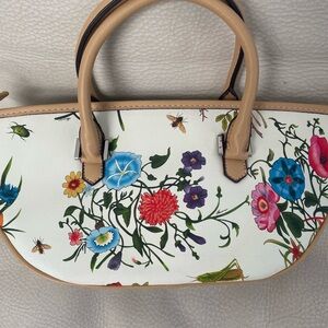 Satchel: florals, bees, dragon fly on cream. 1 interior zip pocket + 2